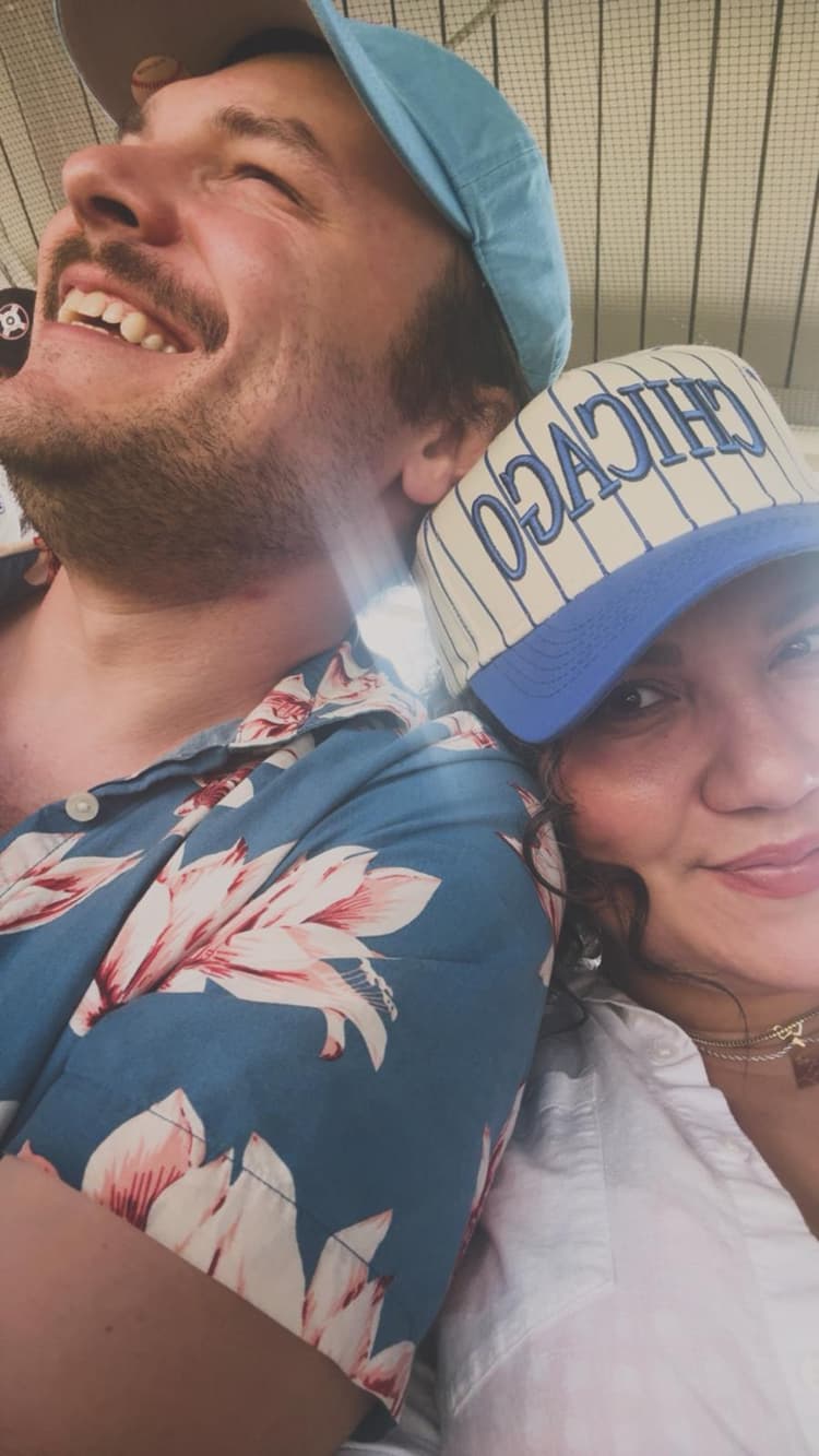 Jason and his girlfriend at a baseball game